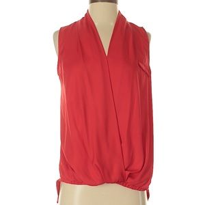 Red sleeveless blouse